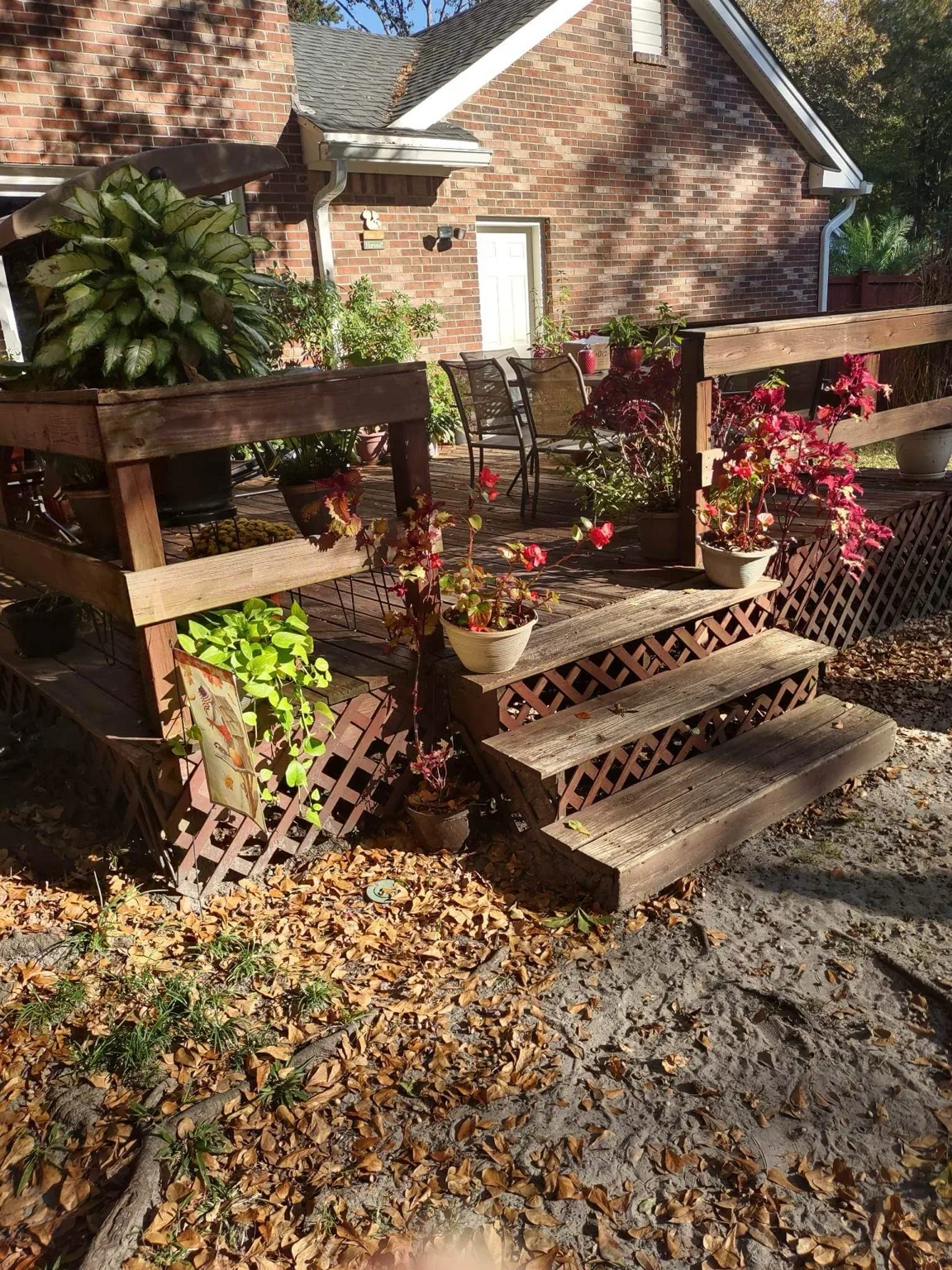Weathered pressure-treated deck before reconstruction