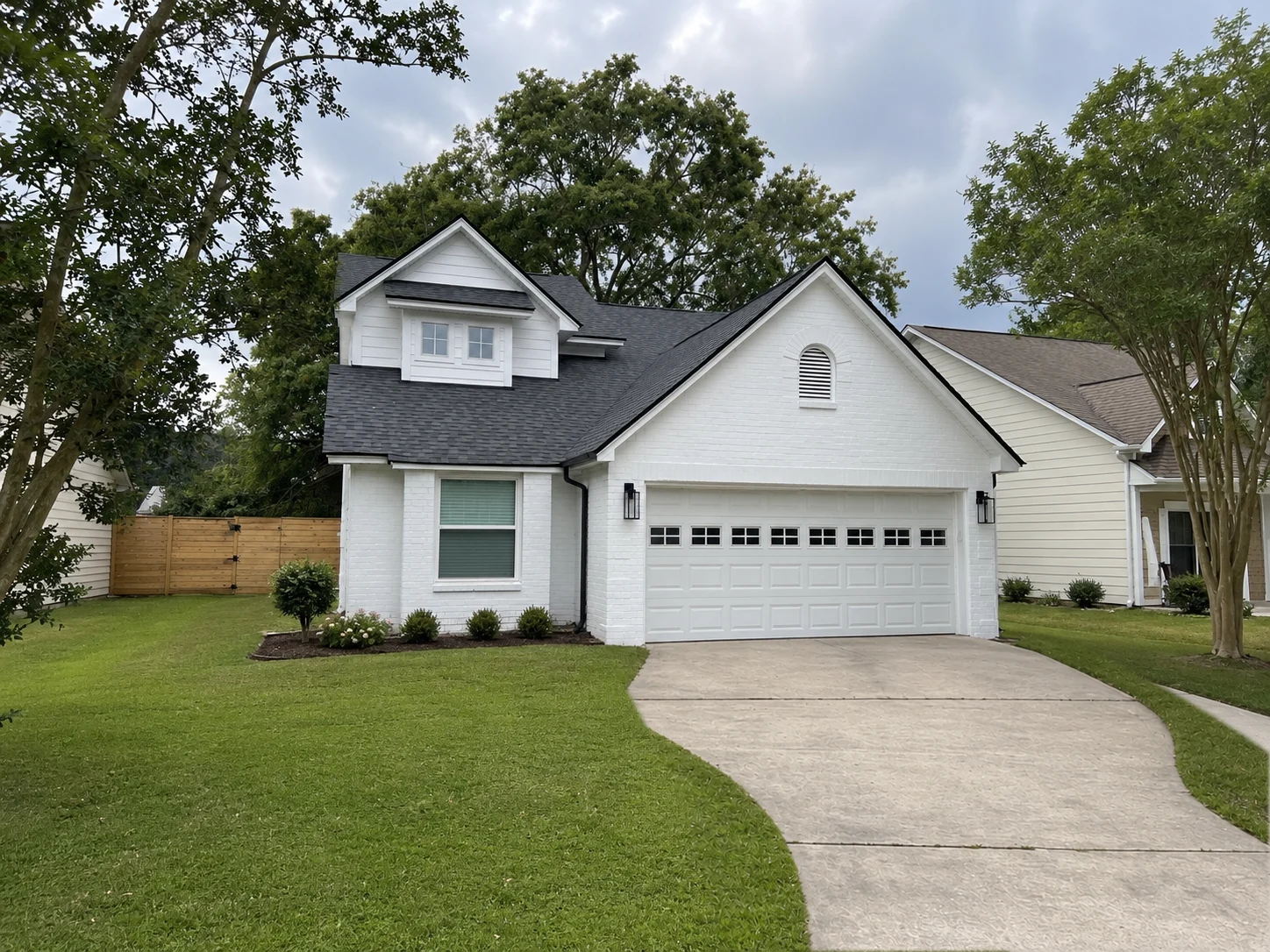Brick-front home after its exterior transformation