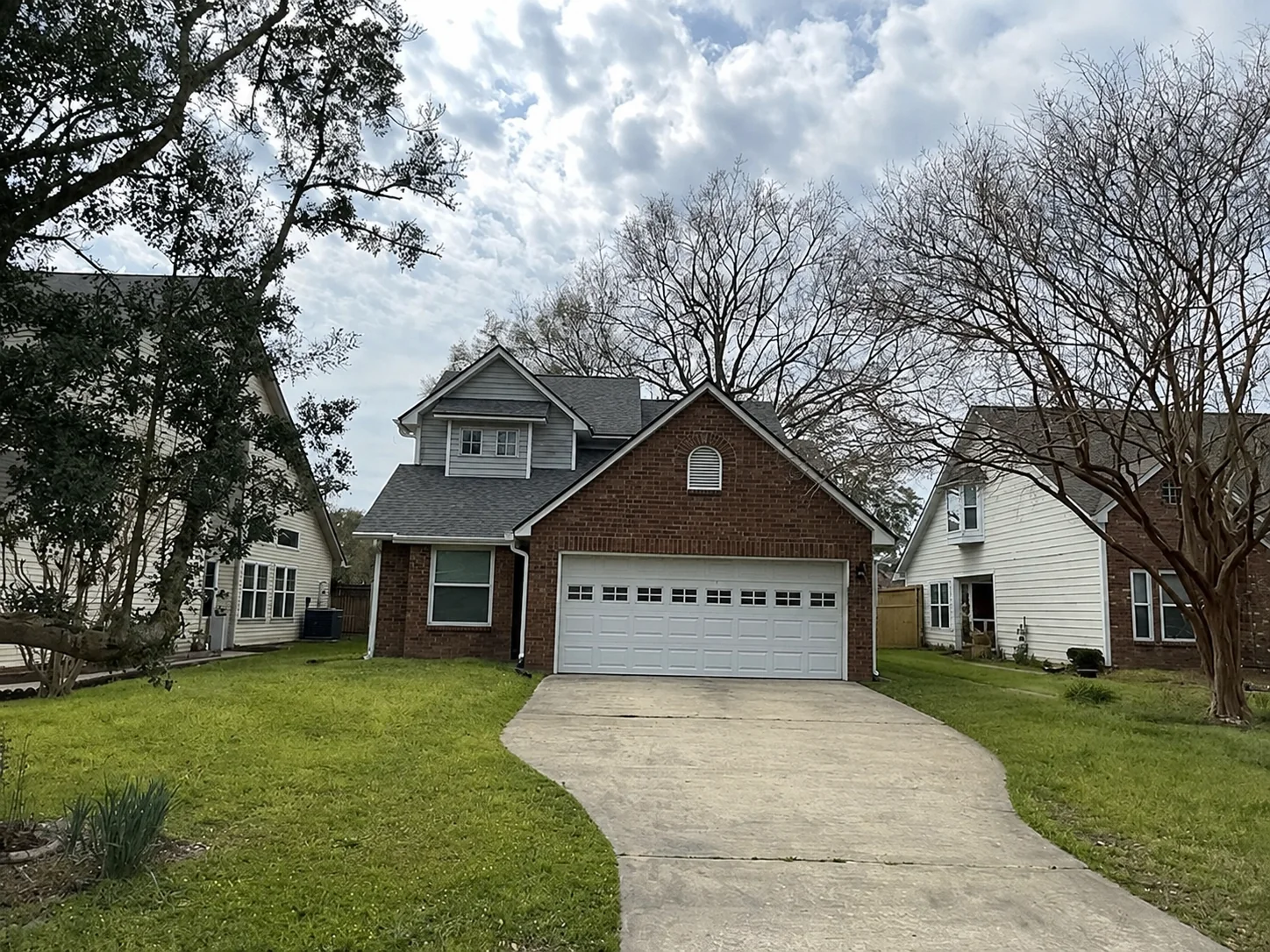 Brick-front home before its exterior project